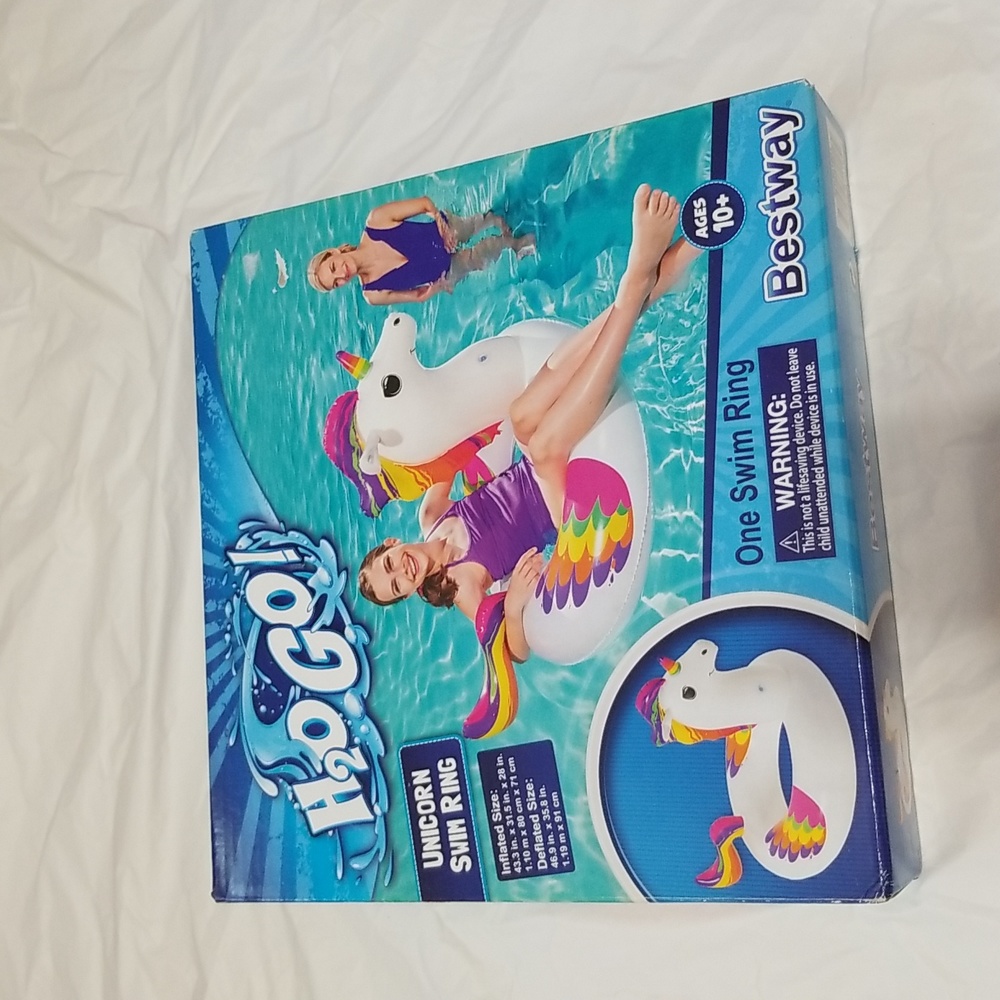 NWT Unicorn swim ring  never opened